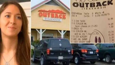 Photo of Two people who work in the Outback restaurant hope that nobody saw the message they wrote on the receipt for the police officers.