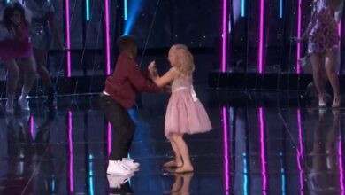 Photo of A boy and a girl enter the dance floor under “Footloose” and circle the judges’ heads.